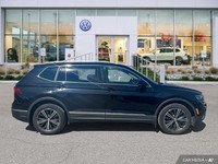 This Volkswagen Tiguan delivers a Intercooled Turbo Regular Unleaded I-4 2.0 L/121 engine powering t... (image 5)