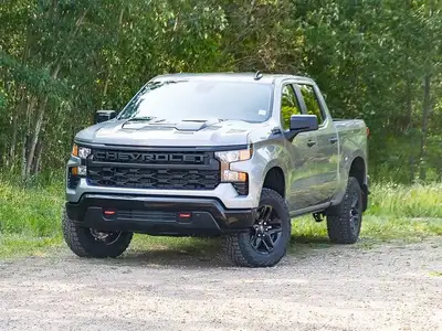 The 2025 Chevrolet Silverado 1500 Custom Trail Boss blends rugged off-road capability with everyday...