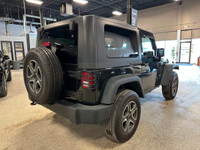 Our 2015 Jeep Wrangler Sport 4WD looks great in a Black Clearcoat. Powered by a 3.6 Litre V6 that pr... (image 4)