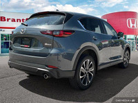 Experience the confident handling and smooth ride of this 2024 Mazda CX-5 GS, boasting only 6904 kil... (image 5)
