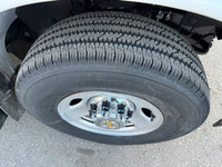 2025 CHEVROLET EXPRESS G3500 LT - 12 Passenger - 6.6 Lit - 8 Cylinder Gasoline engine. White exterio... (image 1)
