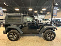 Our 2015 Jeep Wrangler Sport 4WD looks great in a Black Clearcoat. Powered by a 3.6 Litre V6 that pr... (image 5)