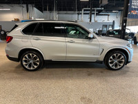 Our 2015 BMW X5 xDrive35i gives you the comfort of an SUV and the spirit of a sports car in Silver M... (image 5)