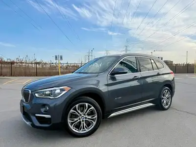 Step into luxury and performance with this sleek 2017 BMW X1 AWD 4dr xDrive28i, available now at Sel...