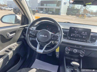 This 2022 Kia Rio 5-door LX+ hatchback offers practical everyday driving with surprising comfort. Wi... (image 8)