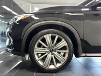 The 2021 Infiniti QX50 presents a compelling combination of power and sophistication with its effici... (image 5)