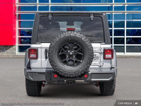 This Jeep Wrangler has a trusty Intercooled Turbo Premium Unleaded I-4 2.0 L/122 engine powering thi... (image 6)