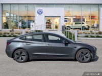 This Tesla Model 3 delivers a Electric engine powering this Automatic transmission. Window Grid Ante... (image 5)