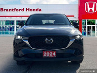 Experience the confident handling and sleek style of this 2024 Mazda CX-5 GS. Boasting a low 35,730k... (image 8)