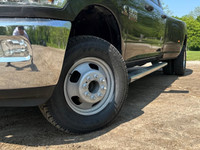 Tough, reliable, and built to handle anything you throw its way — this 2017 Ram 3500 SLT Dually with... (image 1)