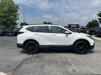 Experience the refined comfort and all-wheel drive capability of this certified pre-owned 2021 Honda... (image 3)