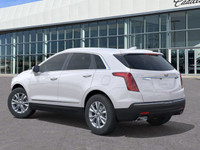 The 2025 Cadillac XT5 Luxury makes a striking entrance finished in Crystal White Tricoat with bold c... (image 5)