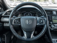 Experience the epitome of elegance and performance with the 2021 Honda Civic Hatchback Sport. Finish... (image 8)