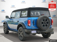 New Price! Odometer is 20559 kilometers below market average! Velocity Blue Metallic 2023 Ford Bronc... (image 2)