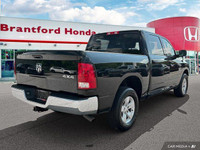 Command the road with this 2022 Ram 1500 Classic SLT Crew Cab Pickup, boasting a powerful 3.6L Penta... (image 5)