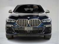This 2020 BMW X6 M50i Coupe commands attention with aggressive styling, a powerful V8 engine, and re... (image 5)