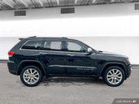 This Grand Cherokee features leather-trimmed, ventilated front seats, heated front and rear seats, p... (image 6)