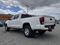 This 2022 Toyota Tacoma Crew Cab Pickup boasts a powerful four-wheel-drive system, perfect for tackl... (image 3)