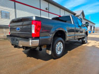 6 Passengers F-250 Diesel 4x4 8FT BED ready for some work and haulin ! Lifted and Deleted. Weather T... (image 9)