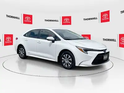 This, is a White 2024 Toyota Corolla Hybrid with LE AWD Package, Featuring:~ Complete Service Histor...