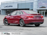 Finished in a Ruby Flare Pearl exterior that complements the Black leather/cloth interior, standing... (image 4)