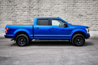This 2018 Ford F-150 is for sale today. This Crew Cab 4X4 pickup has 84,154 kms. It's blue in colour... (image 1)