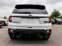The 2023 Honda Passport TrailSport in stunning white is an all-wheel drive powerhouse designed for b... (image 3)