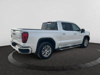 The All New GMC Sierra has been redefined from Hood to Hitch. This 4WD White Sierra is a Crew Cab Pi... (image 4)