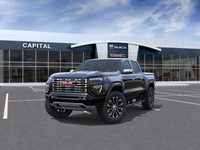This 2025 GMC Canyon in Onyx Black is equipped with 4WD and Turbocharged Gas I4 2.7L/ engine. The GM... (image 7)