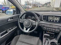 This Kia Sportage delivers a Regular Unleaded I-4 2.4 L/144 engine powering this Automatic transmiss... (image 8)