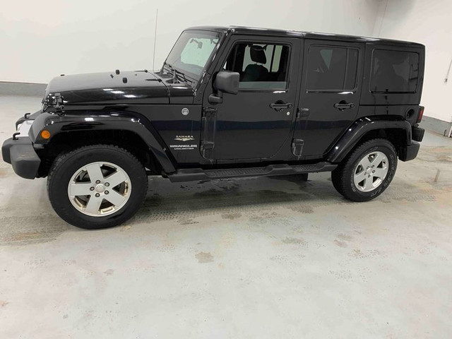 2011 Jeep Wrangler Unlimited Sahara in Cars & Trucks in Lethbridge - Image 3