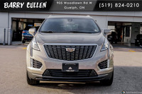 The 2023 Cadillac XT5 FWD Luxury in an elegant tan hue with its nimble front-wheel drive is all abou... (image 9)