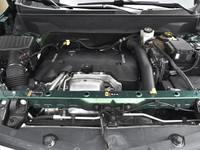 The 2018 Chevrolet Equinox Premier AWD in a striking green finish offers a dependable and confident... (image 7)