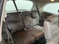 Looking for a spacious and reliable family vehicle? Look no further than this 2015 Honda Odyssey Tou... (image 8)
