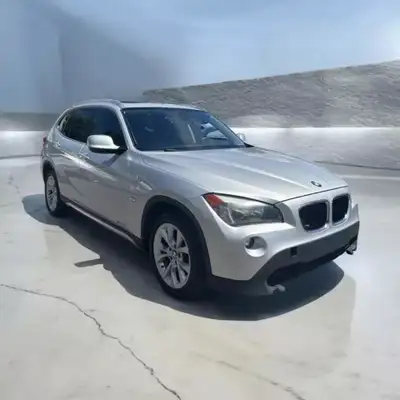 2012 BMW X1 | AWD | Cuir | Toit Ouvrant | $62 par semaines | Air | Mags | Sieges Chauffant | Nous Ac...