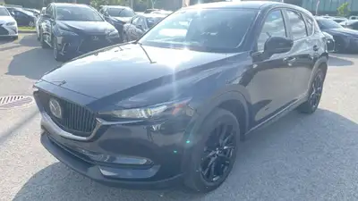 Le Mazda CX-5 Touring 2021 est un VUS compact qui allie style, performance et confort. Positionné da...