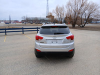 Drive with confidence in this 2011 Hyundai Tucson! With its spacious interior, smooth handling, and... (image 5)
