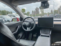 This Tesla Model Y delivers a Electric engine powering this Automatic transmission. Window Grid Ante... (image 8)
