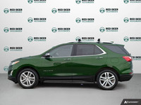 The 2018 Chevrolet Equinox Premier AWD in a striking green finish offers a dependable and confident... (image 3)