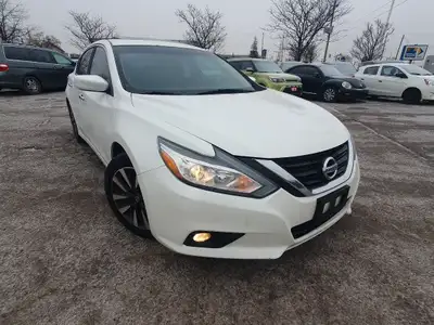 2016 Nissan Altima SV Sedan, navigation,Backup camera ,heated and electric seats, alloys , sunroof ,...