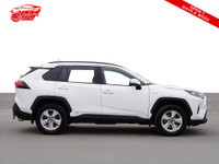 Check out this stylish and fuel-efficient 2020 Toyota RAV4 Hybrid XLE! With its sleek white exterior... (image 4)