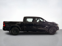 Get behind the wheel of our fierce used 2020 RAM 1500 Rebel Crew Cab short box 4X4 in Diamond Black... (image 5)