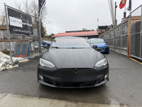 This sleek 2018 Tesla Model S in black is a stylish and eco-friendly choice for your next ride. With... (image 4)
