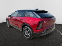 This 2025 Cadillac OPTIQ in Radiant Red Tintcoat is equipped with AWD and Electric engine. Check out... (image 2)