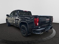 This 2025 GMC Sierra 1500 in Titanium Rush Metallic is equipped with 4WD and Turbocharged Diesel I6... (image 2)