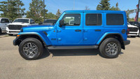 This 2025 JEEP WRANGLER 4-DOOR SAHARA has the following options Cloth Low-Back Bucket Seats, Remote... (image 9)
