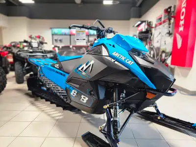 A THRILL SEEKER'S DREAMM 858 Mountain Cat ALPHA ONE All New 858 C-TEC2™ Engine FOX® FLOAT QS3 Shocks...