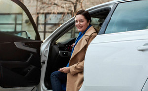 Lady getting out of her car