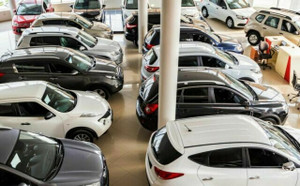 Should I buy a used car from a private seller or car dealership?