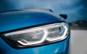 Close-up of a modern sports-car front led headlight